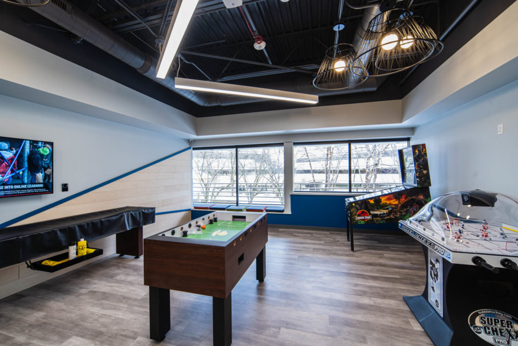 Foosball table and other games in a game room.